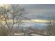 Scenic neighborhood view highlighting mountain range and dramatic clouds at 1331 Alpine St, Longmont, CO 80504