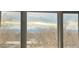 Window view overlooking neighborhood, trees and mountains in the distance at 1331 Alpine St, Longmont, CO 80504