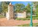 A welcoming entrance to Regis University with manicured landscaping and a stately stone sign at 2824 W Parkside Pl, Denver, CO 80221