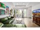 Bright and airy living room featuring hardwood floors and modern decor at 2824 W Parkside Pl, Denver, CO 80221