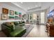 Bright living room with modern decor, hardwood floors, and a cozy atmosphere at 2824 W Parkside Pl, Denver, CO 80221