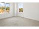 Bright bedroom with new carpet flooring and double windows overlooking the neighborhood at 4650 W 9Th Ave, Denver, CO 80204