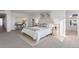 Well-lit bedroom with modern decor, a comfortable bed, a cozy rug, and ample natural light at 4650 W 9Th Ave, Denver, CO 80204