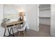 Charming office space with a minimalist desk, stylish chair, and closet, perfect for a functional workspace at 4650 W 9Th Ave, Denver, CO 80204