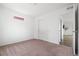 Simple carpeted bedroom with closet and natural light at 18645 E 54Th Pl, Denver, CO 80249