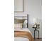 Cozy bedroom with soft lighting and stylish decor on a side table at 18645 E 54Th Pl, Denver, CO 80249