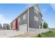 Modern two-story home offers ample parking, attached garage, and a well-maintained exterior at 18645 E 54Th Pl, Denver, CO 80249