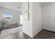 Inviting entryway boasts natural light, stylish decor, and a welcoming ambiance at 18645 E 54Th Pl, Denver, CO 80249