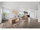 Bright living room featuring hardwood floors and natural light at 18645 E 54Th Pl, Denver, CO 80249