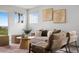 Inviting living room features stylish furniture, neutral decor, and a balcony at 18645 E 54Th Pl, Denver, CO 80249