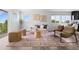 Cozy living room with modern furnishings and a stylish area rug at 18645 E 54Th Pl, Denver, CO 80249