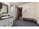 Bathroom area that leads to a wooden sauna with a nice vanity area and white cabinets at 7801 W 35Th Ave # 406, Wheat Ridge, CO 80033
