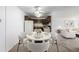 Charming dining area adjacent to the kitchen, perfect for casual meals or intimate gatherings at 7801 W 35Th Ave # 406, Wheat Ridge, CO 80033