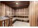 A light wooden sauna with benches on multiple levels for a relaxing experience at 7801 W 35Th Ave # 406, Wheat Ridge, CO 80033