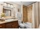 Bathroom featuring a single sink, shower, tub, and toilet at 7115 Parkwood Ln, Castle Pines, CO 80108