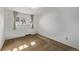 Cozy bedroom featuring a window with curtains and neutral carpeting at 2813 S Ivan Way, Denver, CO 80227