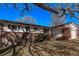 Charming single-Gathering home with a brick facade, attached garage, and a well-maintained front yard at 2813 S Ivan Way, Denver, CO 80227