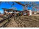 Charming single-Gathering home with a brick facade, attached garage, and a well-maintained front yard at 2813 S Ivan Way, Denver, CO 80227