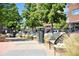 Landscaped walkway with benches and planters at 2958 Syracuse St # 303, Denver, CO 80238