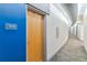 Building hallway with modern finishes and lighting at 2958 Syracuse St # 303, Denver, CO 80238