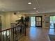 Lobby area featuring railings, indoor plants, and an entryway leading to the parking area at 7865 E Mississippi Ave # 706, Denver, CO 80247