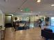 Elevated lobby with stairs, railings, and lounge seating with access to the entryway at 7865 E Mississippi Ave # 706, Denver, CO 80247