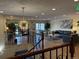 Lobby area with chandelier, plants, seating, contemporary art, and entryway access at 7865 E Mississippi Ave # 706, Denver, CO 80247