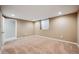 Bedroom featuring neutral carpet, natural light, and a standard-sized window at 6595 Meade Ct, Arvada, CO 80003