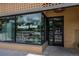 Bakery Four retail storefront with glass windows, brick facade, and modern design at 6595 Meade Ct, Arvada, CO 80003