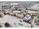 Aerial view of property with gated entrance, playground and unit location at 5726 N Genoa #204 and abundant parking at 5726 N Genoa Way # 204, Aurora, CO 80019