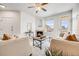 Living room with fireplace and comfortable seating at 5726 N Genoa Way # 204, Aurora, CO 80019