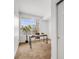 Bright office area with desk, chair, and ample natural light at 5726 N Genoa Way # 204, Aurora, CO 80019