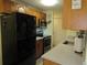 Kitchen with stainless steel appliances and ample cabinet space at 2325 S Linden Ct # 101, Denver, CO 80222