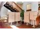 Building interior featuring community mailboxes, seating, and staircase access at 2325 S Linden Ct # 101, Denver, CO 80222