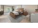 Comfortable bedroom featuring neutral colors, a large window and nice furnishings at 3310 S Oneida Way, Denver, CO 80224