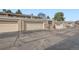 Attached garages with brick facade provide convenient and secure parking for residents and their vehicles at 3310 S Oneida Way, Denver, CO 80224