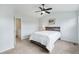 Cozy bedroom with carpet, vaulted ceiling, and natural light at 2408 Concord Cir, Lafayette, CO 80026