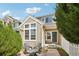 Charming home featuring a cozy front patio with seating, perfect for relaxing outdoors at 2408 Concord Cir, Lafayette, CO 80026