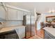 Well-equipped kitchen boasting stainless steel appliances and sleek, light-colored cabinetry at 2408 Concord Cir, Lafayette, CO 80026