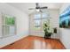 Bright living room offering large windows and hardwood floors at 2408 Concord Cir, Lafayette, CO 80026