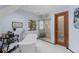 Updated bathroom with a freestanding tub, glass shower, and luxurious black-and-white patterned tile floors at 689 Red Deer Rd, Franktown, CO 80116