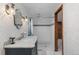 Bathroom featuring a marble vanity and large walk-in shower at 689 Red Deer Rd, Franktown, CO 80116