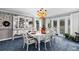 Formal dining room with china cabinet and carpeted floor at 689 Red Deer Rd, Franktown, CO 80116