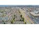 Wide aerial view of the property's neighborhood showing nearby buildings and roads at 7860 E Ellsworth Ave, Denver, CO 80230