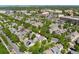 Neighborhood aerial showcasing the property with a marker, lush trees, and community amenities at 7860 E Ellsworth Ave, Denver, CO 80230