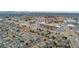 Wide aerial view of the property's neighborhood showing nearby buildings at 7860 E Ellsworth Ave, Denver, CO 80230