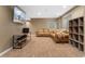 Finished basement featuring neutral carpet, recessed lighting, and comfortable seating at 7860 E Ellsworth Ave, Denver, CO 80230