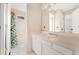 Clean bathroom with ample counter space and tub-shower combination at 7860 E Ellsworth Ave, Denver, CO 80230