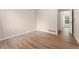 Neutral bedroom with light-filled windows and hardwood floors, ideal for relaxation at 7860 E Ellsworth Ave, Denver, CO 80230