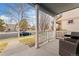 Inviting front porch with comfortable seating, offering a relaxing view of the neighborhood at 7860 E Ellsworth Ave, Denver, CO 80230